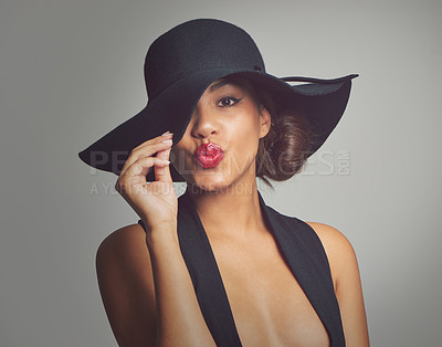 Buy stock photo Studio shot of a stylishly dressed young woman 