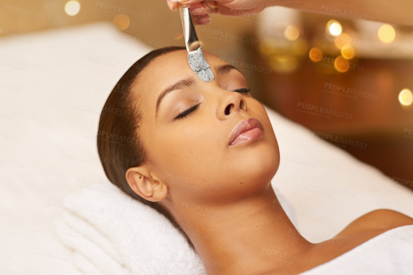 Buy stock photo Cropped shot of a young woman enjoying a skincare treatment at the spa