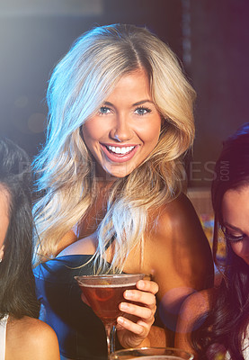 Buy stock photo Shot of young women partying in a nightclub