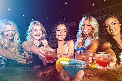Buy stock photo Cocktails, happy hour and friends at club with a toast to celebrate, new years social and drinks during a girls night. Party, alcohol and group of women with a cheers during a celebration at an event