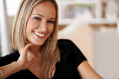 Buy stock photo Face, woman and smile in lounge or home for leisure, break and enjoy in couch. Female person, happy and satisfied with comfort or joy in living room, sofa and positivity for self care in house