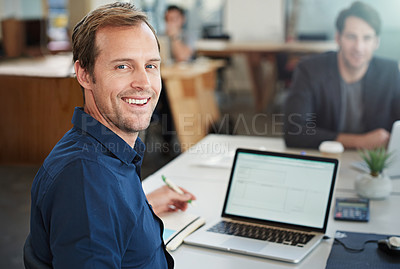 Buy stock photo Portrait of a designer working on a laptop in an office