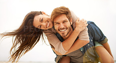 Buy stock photo Love, hug and portrait of couple piggyback at beach, hug and laughing while bonding outdoor. Face, embrace and happy man with woman at the ocean for travel, freedom or vacation, holiday or Miami trip