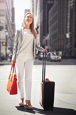 Buy stock photo Business woman, luggage and happy on sidewalk with vision on journey with walk, suit or dream in street. Person, smile and baggage for travel in city on metro road by skyscraper buildings in New York