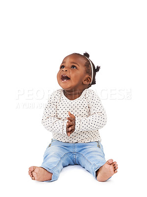 Buy stock photo Baby girl, playing and clapping with smile in studio for applause, fun and cheerful on white background. Child, learning and motor skills for childhood development, excited and happy kid or infant
