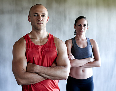 Buy stock photo Serious people, fitness and portrait with arms crossed in confidence for workout, exercise or training at gym. Strong and confident man and woman personal trainer with ambition for healthy wellness