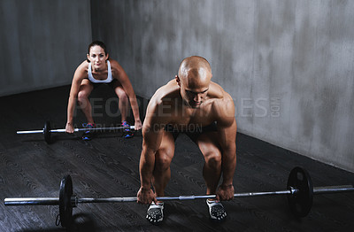 Buy stock photo Fitness, people and weightlifting with barbell for workout, bodybuilding or exercise at the gym. Fit, active and strong muscular man and woman lifting weight for intense strength, muscle or training