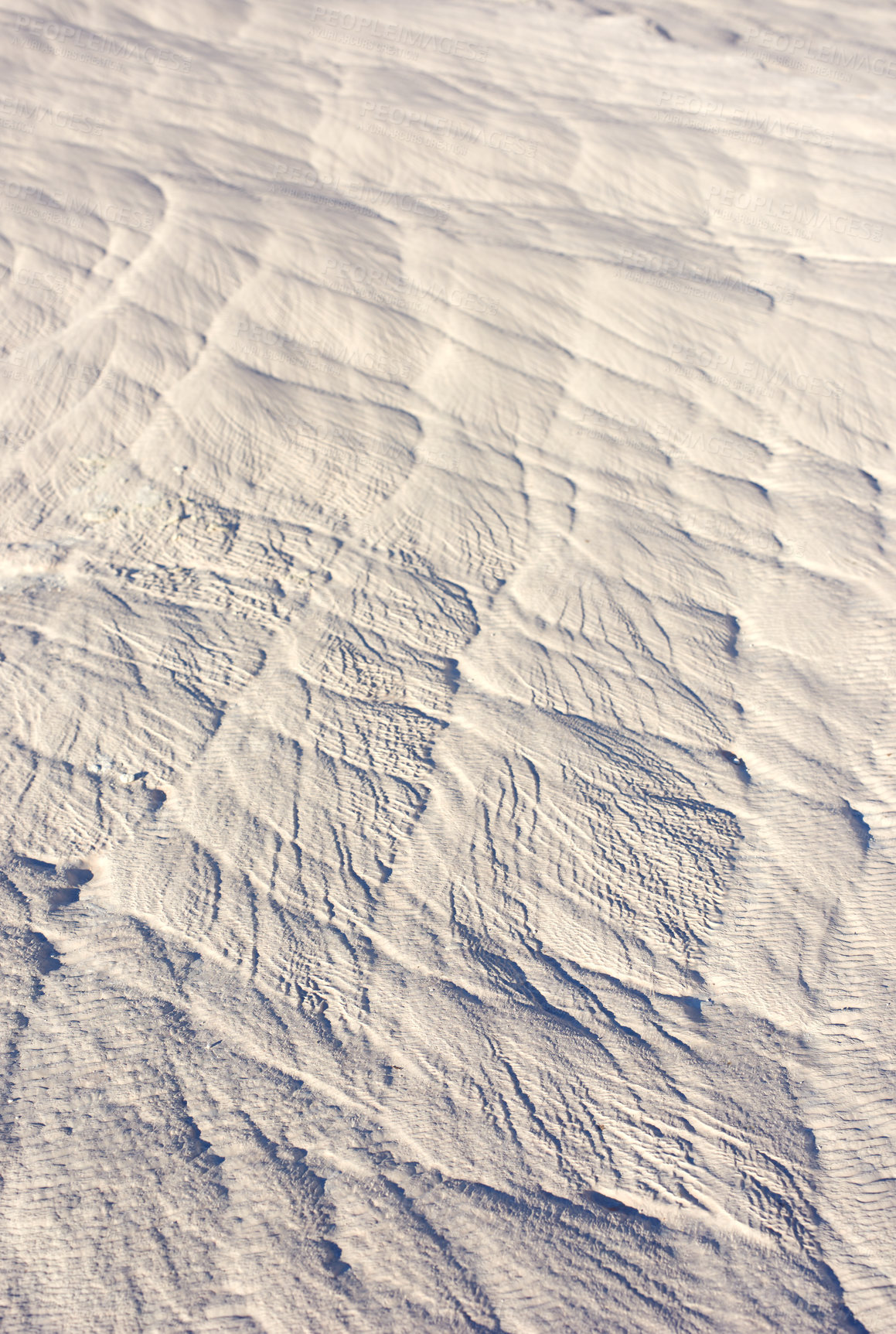 Buy stock photo Closeup overhead of the snowy ground filled with line patterns in travertine terraces in Pamukkale, Turkey. Snow covered grounds with rippled pattern texture. Above zoom view white iced ground