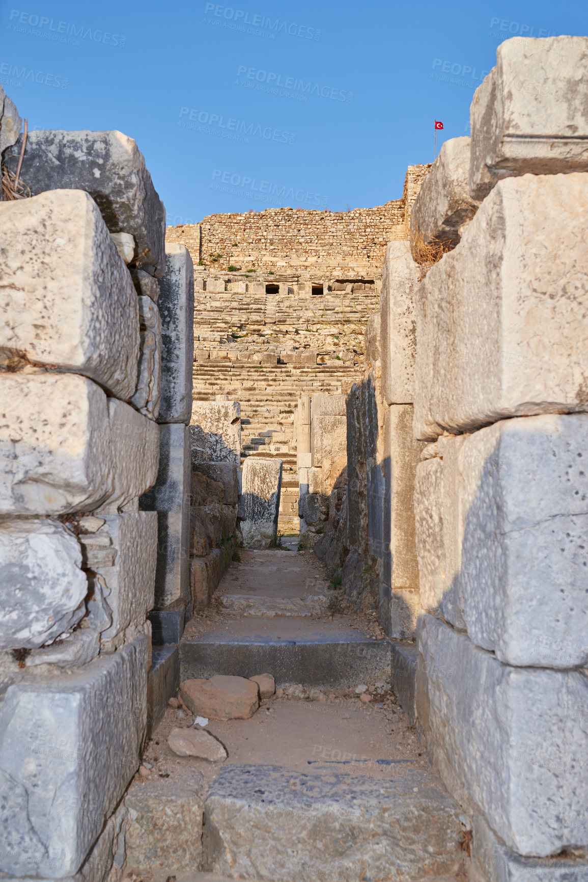 Buy stock photo Greece, stone and passage in ruins for architecture, archeology and travel to ancient city. History, rock and path in abandoned Greek theater for exploration, culture and anthropology in Miletus