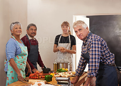 Buy stock photo Cooking, food and portrait of people in kitchen learning healthy diet, nutrition and wellness. Culinary class, chef skills and men and women with ingredients, vegetables or organic produce for dinner