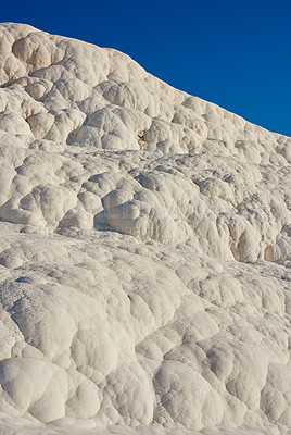 Buy stock photo Closeup of travertine pools and terrace rock in Pamukkale, Turkey in famous tourism holiday or vacation destination. Cotton castle area with carbonate mineral after flowing thermal spring water