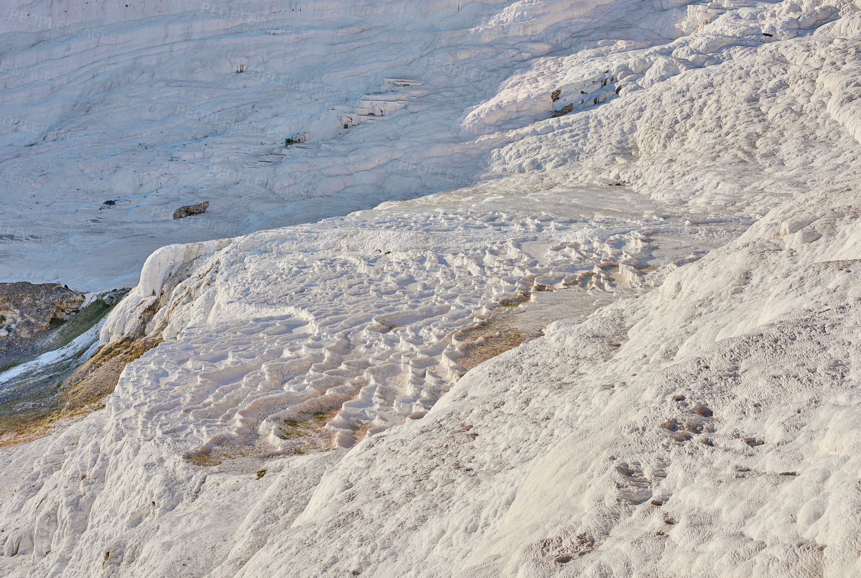 Buy stock photo Closeup of travertine pools and terraces in Pamukkale, Turkey. Traveling abroad, overseas for vacation. Cotton castle area with carbonate mineral after flowing thermal spring water from above