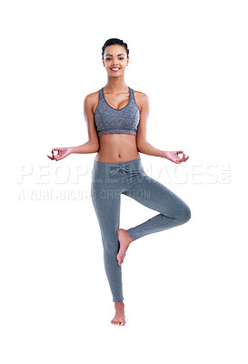 Buy stock photo Full length portrait of a female athlete meditating against a white background