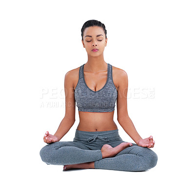 Buy stock photo Full length shot of a female athlete meditating against a white background