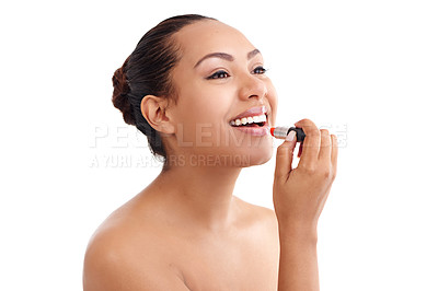 Buy stock photo Happy woman, makeup and cosmetics with lipstick for beauty treatment on a white studio background. Female person, brunette or model with smile for lip gloss, shine or glow in cosmetology or grooming