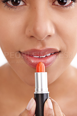 Buy stock photo Woman, lipstick and cosmetics with makeup for beauty treatment on a white studio background. Closeup of female person, mouth or lips of model applying gloss, shine or glow in cosmetology or grooming