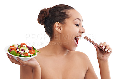 Buy stock photo Happy woman, salad and chocolate with choice for diet, nutrition or healthy balance on a white studio background. Female person, brunette or model in decision for dessert or bowl of vegetables to eat