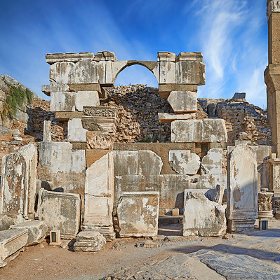 Buy stock photo Ancient city ruins of Ephesus in Turkey during the day. Traveling abroad and overseas for holiday, vacation and tourism. Excavated remains of historical building stone of Turkish history and culture