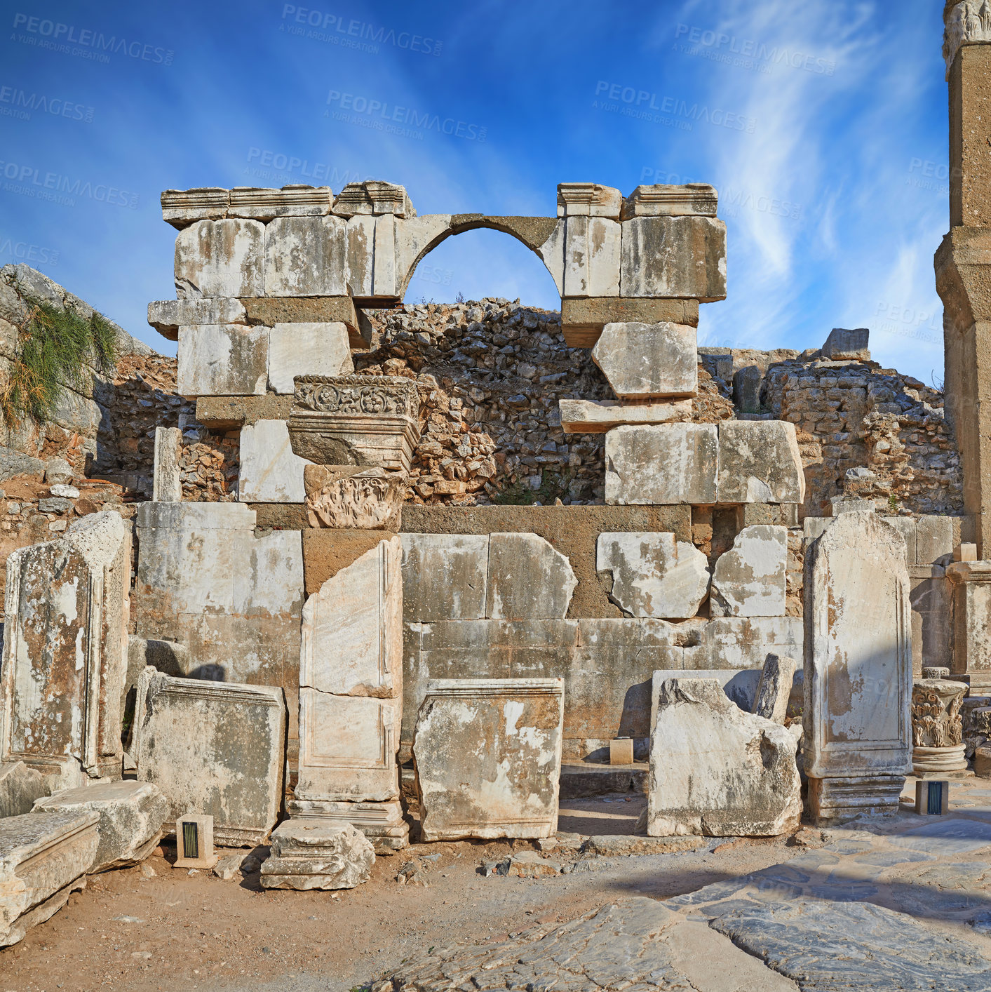 Buy stock photo Ancient city ruins of Ephesus in Turkey during the day. Traveling abroad and overseas for holiday, vacation and tourism. Excavated remains of historical building stone of Turkish history and culture
