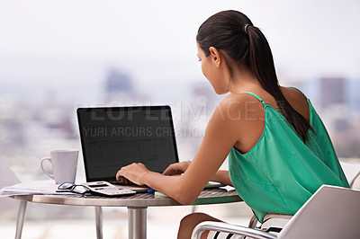 Buy stock photo Woman, outdoor and laptop screen for planning, research and copywriting on her balcony. business writer, editor or freelancer back, typing on computer for editing on website in work from home project