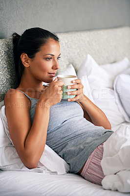 Buy stock photo Woman, drinking coffee and bed thinking for relax in morning  on weekend or home break, day off or leisure. Female person, beverage and linen in apartment with thoughts for Sunday, resting or calm