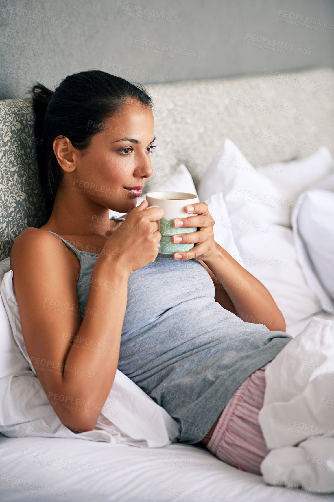 Buy stock photo Woman, drinking coffee and bed thinking for relax in morning  on weekend or home break, day off or leisure. Female person, beverage and linen in apartment with thoughts for Sunday, resting or calm