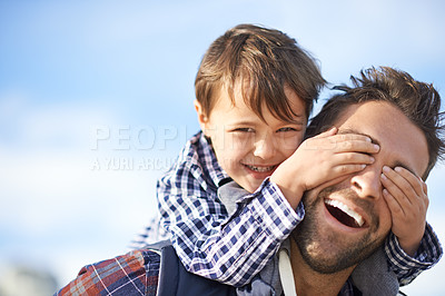 Buy stock photo Shjot of a father and son enjoying a day outdoors