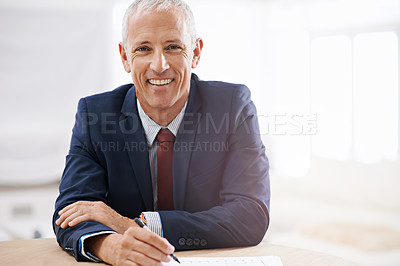 Buy stock photo Office, writing and portrait of business man with confidence for career, job and working at desk. Professional, startup agency and senior person with notebook for company pride, smile and planning
