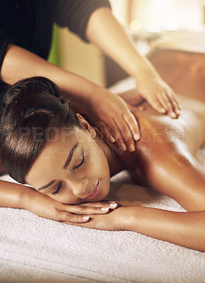 Buy stock photo High angle shot of a young woman getting a massage at the spa