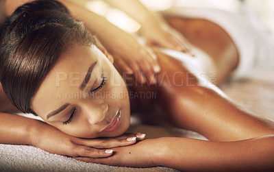 Buy stock photo High angle shot of a young woman getting a massage at the spa