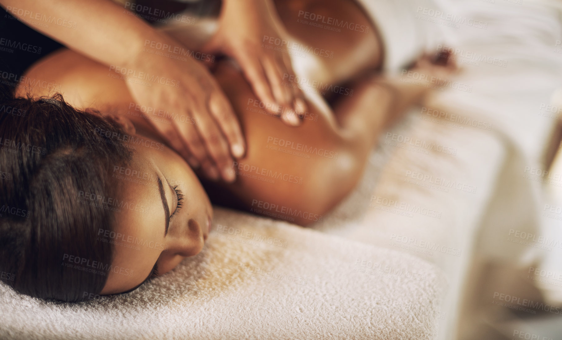 Buy stock photo Woman, relax and body massage at spa with hands for treatment, skincare and wellness. Calm client on table and therapist or masseuse service with shoulder, muscle and stress relief for holistic care