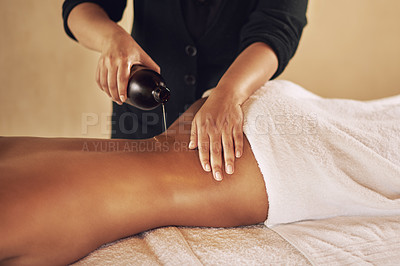 Buy stock photo Woman, back and massage with oil at spa to relax or wellness with luxury or body therapy services for skincare. Hand, therapist and holistic healing with liquid for self care or peace on vacation