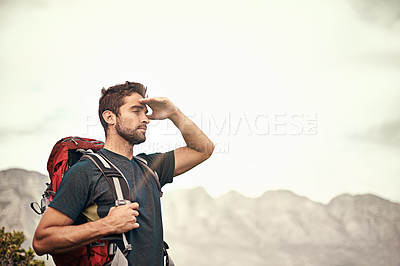 Buy stock photo Trekking, mountain and man on an adventure thinking after exercise, workout and fitness in nature for wellness. Travel, vacation and young male person on a break in mockup space, training and hiking