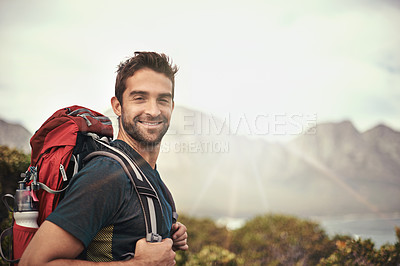 Buy stock photo Man, hike and satisfied for adventure with backpack for fitness, workout and explore with hobby in Canada. Lens flare, portrait and smile in nature for healthy mind in woods and summer holiday