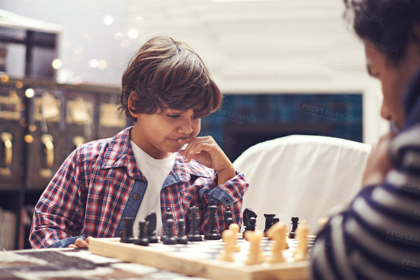 Buy stock photo Child, father and chess game with thinking strategy or checkmate move with knight, king or queen. Son, parent and board for competition learn or decision thoughts for play, contest or problem solving