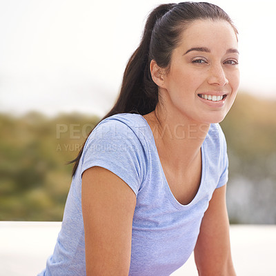 Buy stock photo Cropped portrait of a young woman doing yoga outdoors