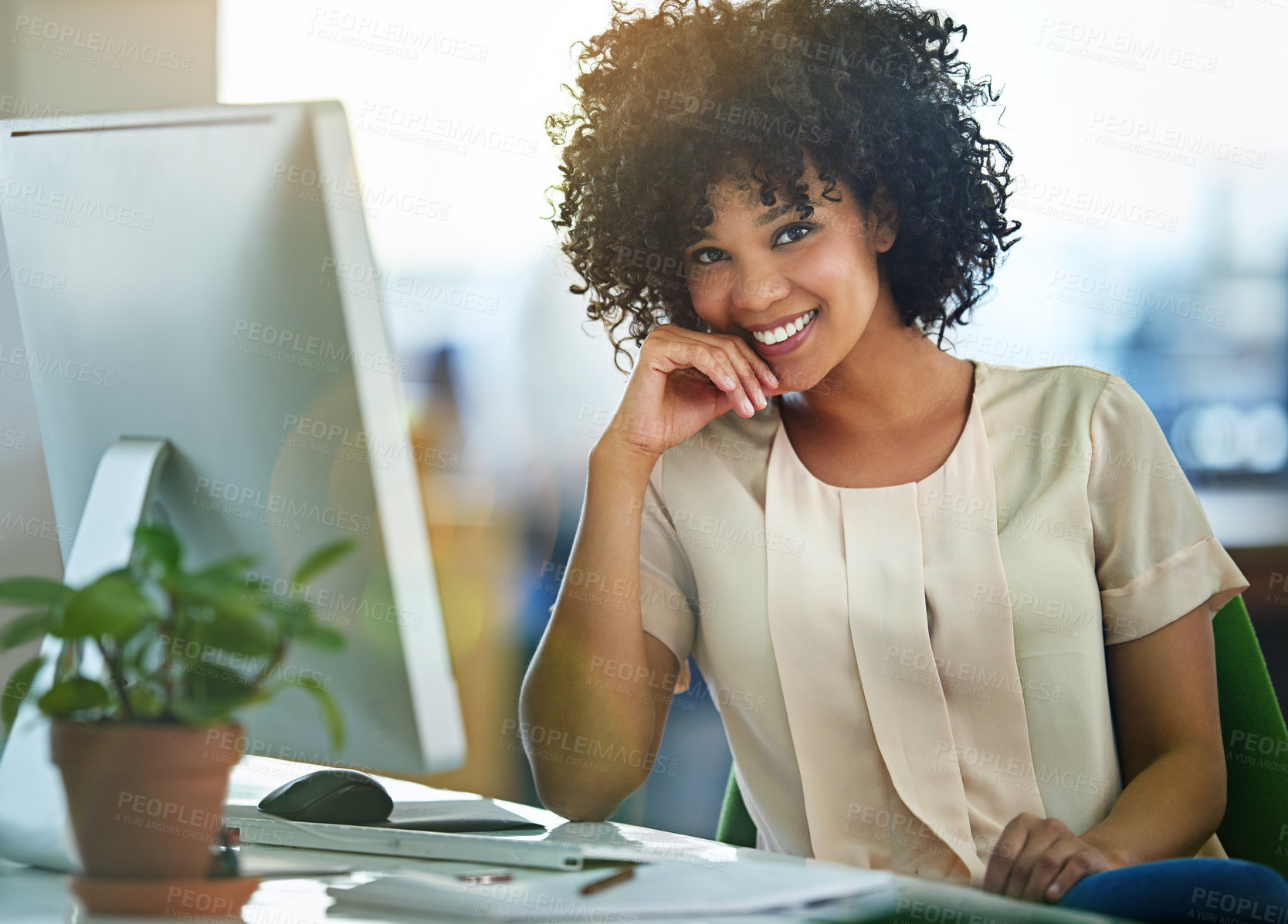 Buy stock photo Successful, happy and confident business woman sitting at computer at desk with a positive mindset. Beautiful, healthy female entrepreneur or innovative, trustworthy leader smiling while working.