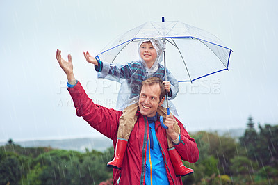 Buy stock photo Other, child or family with an umbrella in rain weather outdoor for fun, happiness and quality time. Man and boy kid in nature with protection from water drops with freedom while playing in winter