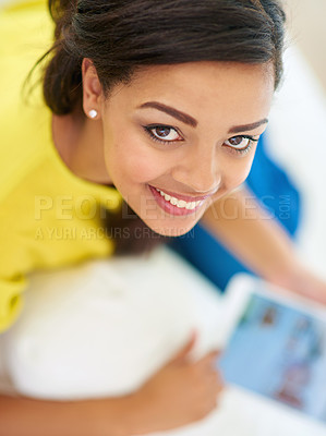 Buy stock photo Woman, tablet and portrait on couch for e learning, fun or online with social media or streaming. Female person, house and relax for break, texting and internet with gaming or browsing in high angle