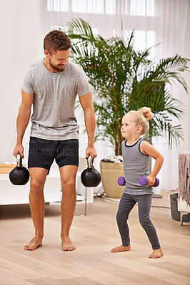 Buy stock photo Man, girl kid and weightlifting for fitness, father and daughter spending time together for love in living room. Dumbbells, kettlebell and muscle training with exercise and bonding at family home