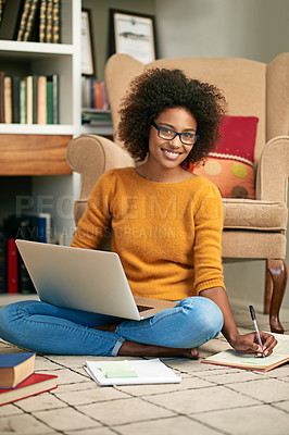 Buy stock photo Full length portrait of a young woman using her laptop to study