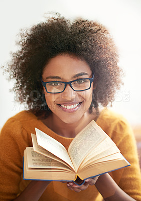 Buy stock photo Book, portrait and black woman in living room to read for literature, leisure and hobby at home. Smile, education and face of female student in lounge for learning, knowledge and information