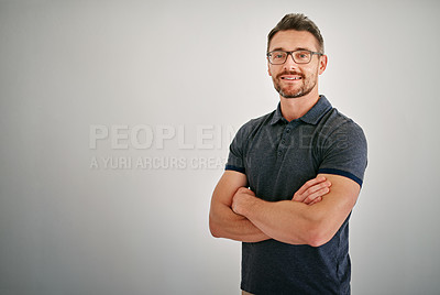 Buy stock photo Cropped portrait of a mature man standing against a gray background