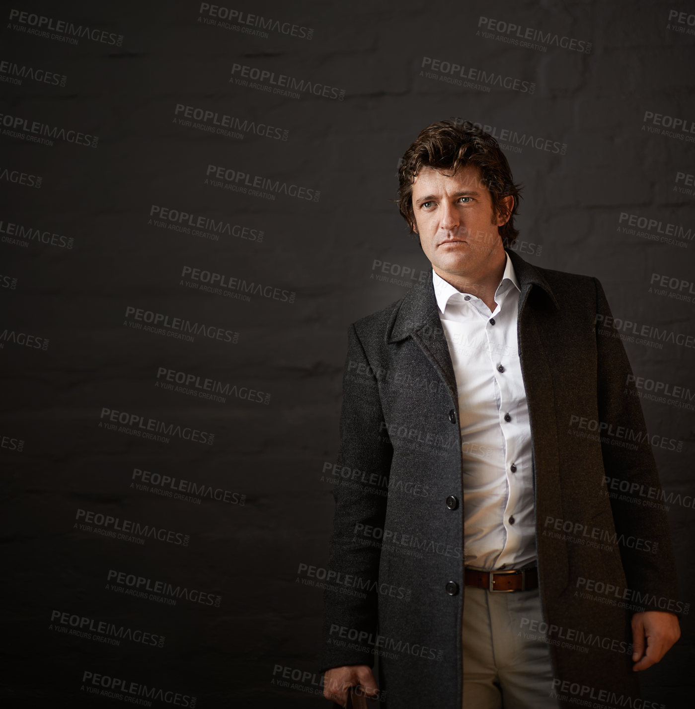 Buy stock photo Brick wall, space and thinking with detective man in coat for crime, investigation or justice. Agency, idea and mockup with mature investigator in dark studio for law, legal security or safety