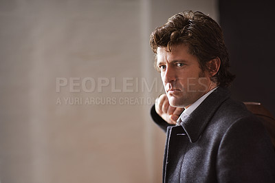 Buy stock photo Cropped portrait of a determined businessman in his office