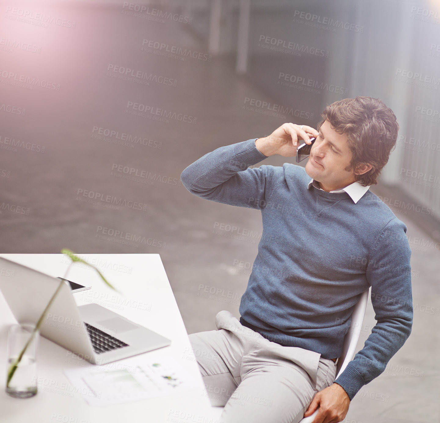 Buy stock photo Businessman, listening and laptop with phone call for discussion, proposal or creative startup at office. Young man or designer talking on mobile smartphone for business conversation at workplace