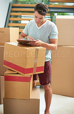 Buy stock photo Man, boxes and delivery with clipboard in home, logistics and check documentation for reading, invoice and tax. Person, cardboard and package with paperwork for service, cargo and stock in new house