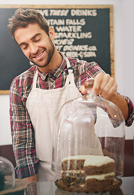 Buy stock photo Man, waiter and cake on counter in coffee shop for display, service and catering with smile in morning. Person, barista or business owner in cafe, bakery or diner with pride, ideas and snack in Italy