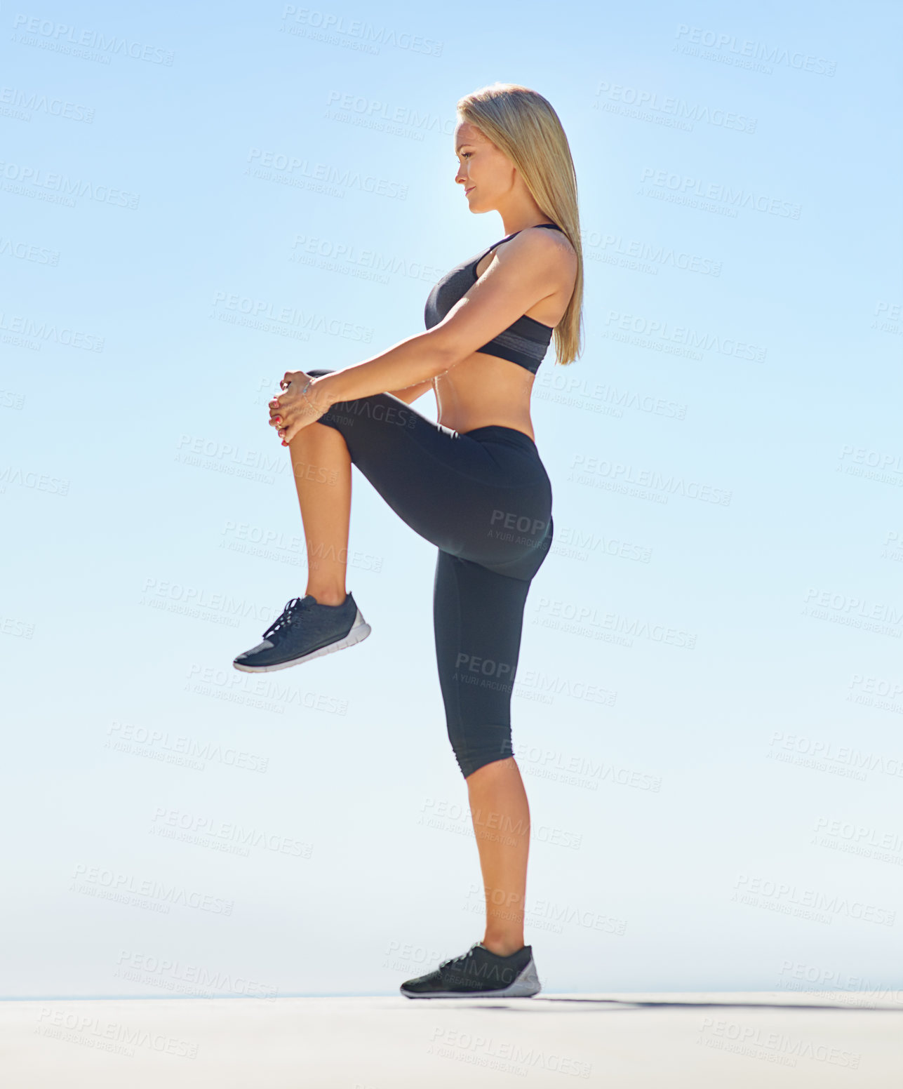 Buy stock photo Fitness, outdoor and woman stretching legs for body wellness, health and prepare for exercise practice. Blue sky, athlete and warm up for training, sports and getting ready for workout with space