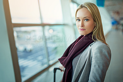 Buy stock photo Portrait of a young woman standing in an airport